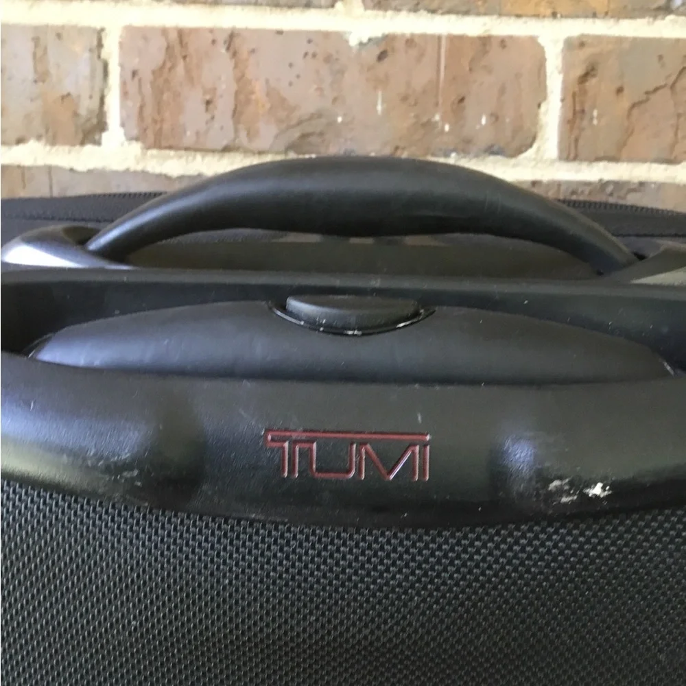 Tumi Black Men's Rolling Carry-On Travel Bag